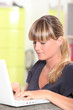 Young woman working on her laptop