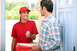Photo: Woman delivering pizza Woman delivering pizza