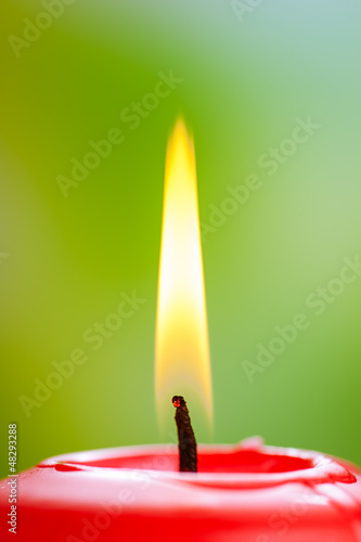 Photo: Red burning candle Red burning candle