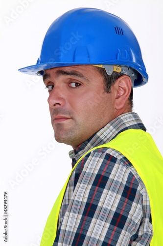 Photo: A nervous-looking tradesman A nervous-looking tradesman