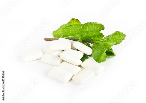 Photo: Bubble gum with mint on white background Bubble gum with mint on white background