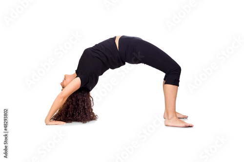 Photo: Brunette Woman Doing Yoga Exercises Brunette Woman Doing Yoga Exercises