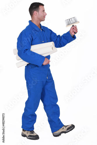 Photo: Handyman going to pose wallpaper. Handyman going to pose wallpaper.