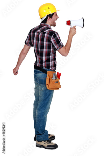 Photo: Foreman screaming in a bullhorn Foreman screaming in a bullhorn
