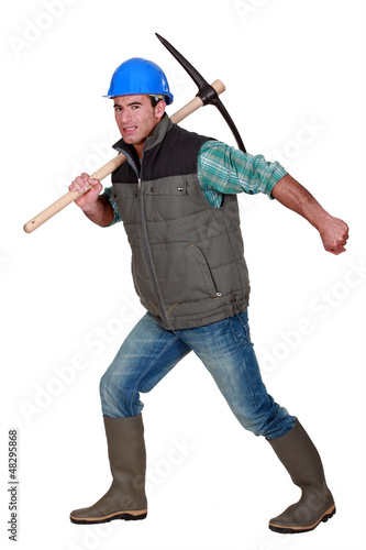 Photo: Man with pick-axe Man with pick-axe