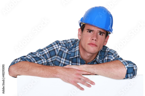 Photo: A glaring tradesman A glaring tradesman