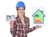 Woman with energy consumption sign