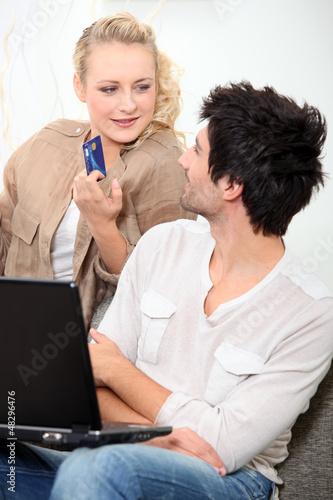 Photo: Couple shopping online Couple shopping online