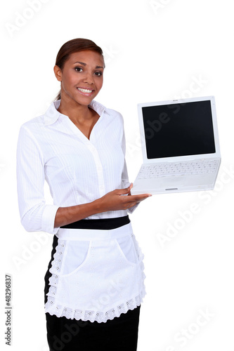 Photo: Waiter holding laptop Waiter holding laptop