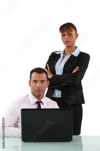 Photo: Serious business couple Serious business couple