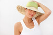Brunette wearing straw hat