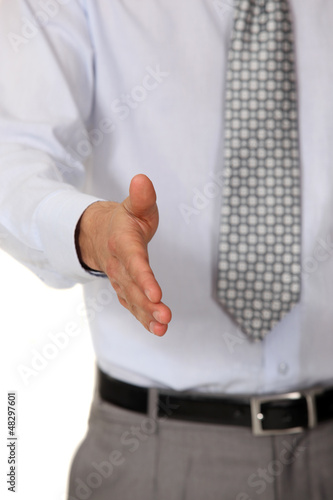 Photo: Close-up of man offering to shake hands Close-up of man offering to shake hands