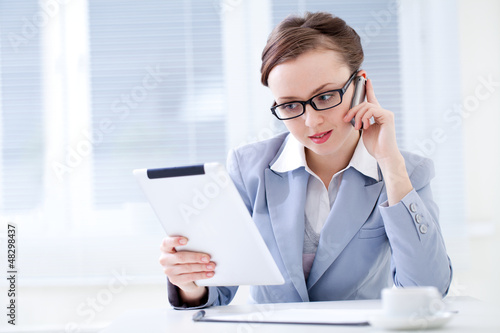 Photo: Woman in office Woman in office