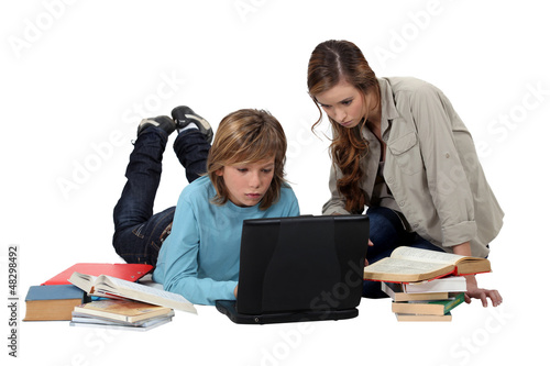 Photo: kid doing his homework kid doing his homework