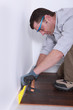 Man laying parquet floor