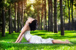 Yoga cobra pose in the park