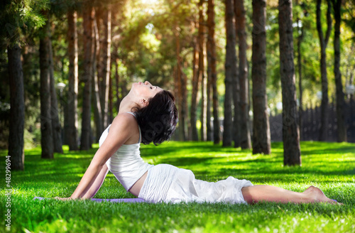 Photo: Yoga cobra pose in the park Yoga cobra pose in the park