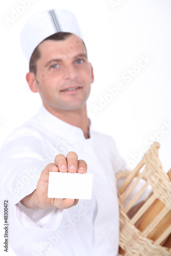 Photo: Baker with breadbasket and business card Baker with breadbasket and business card