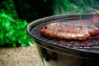 Photo: Tradtional South African braai barbecue borewors sausage on fire Tradtional South African braai barbecue borewors sausage on fire