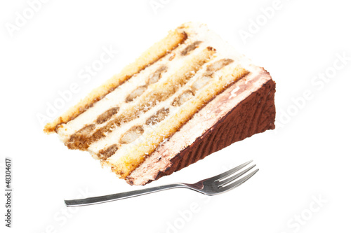 Photo: Liegende Tiramisu Torte mit Gabel davor Liegende Tiramisu Torte mit Gabel davor