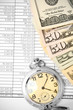 Watch and dollars on the documents.