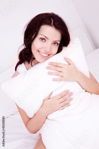 Photo: woman with a pillow woman with a pillow