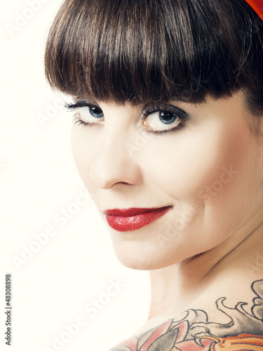 Photo: Vintage woman with a tattoo Vintage woman with a tattoo