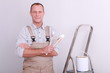 Photo: Painter with brush in hand Painter with brush in hand