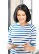 happy teenage girl with tablet pc computer