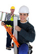 Two artisan workers arriving at work
