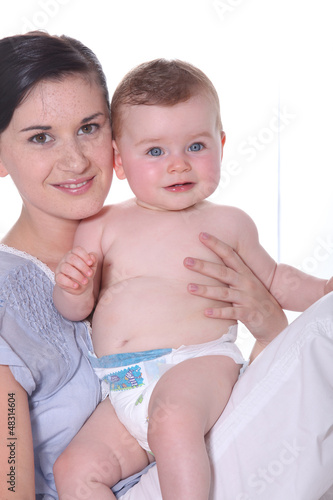 Photo: Girl holding baby Girl holding baby