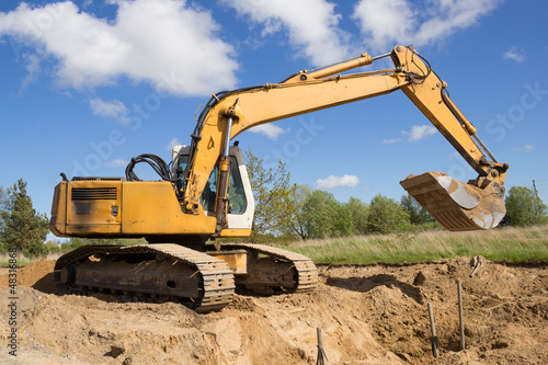 Photo: excavator working excavator working