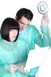 medical staff with computer