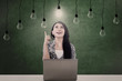 Foto: Bright light bulb and woman Bright light bulb and woman