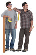 Tradesmen being distracted by an attractive woman