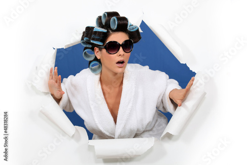 Photo: Surprised woman in hair rollers Surprised woman in hair rollers