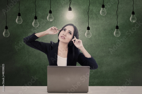 Photo: Businesswoman think of ideas Businesswoman think of ideas