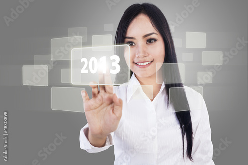 Photo: Businesswoman touch screen 2013 Businesswoman touch screen 2013