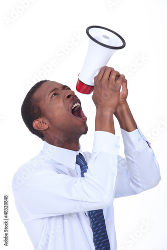 Photo: Businessman with a loudspeaker Businessman with a loudspeaker