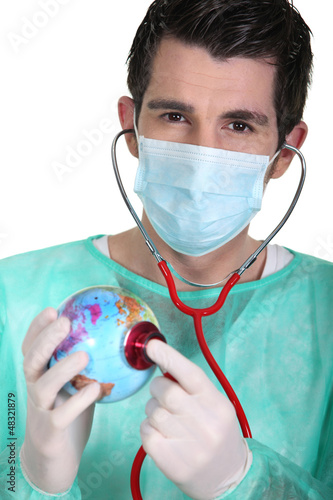 Photo: General practitioner with globe General practitioner with globe
