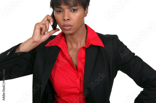 Photo: black businesswoman on the phone black businesswoman on the phone