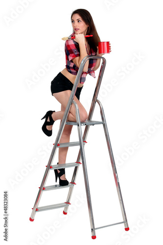 Photo: Seductive brunette decorator Seductive brunette decorator