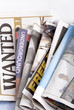stack of various newspapers