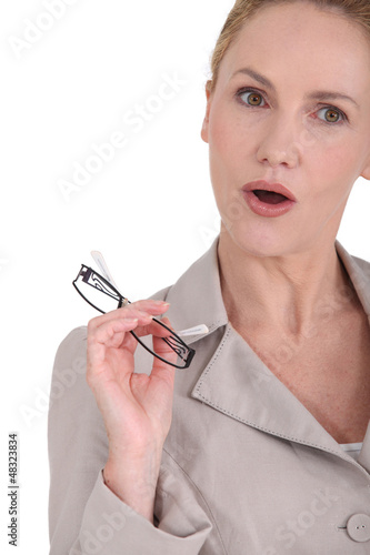 Photo: Businesswoman looking surprised Businesswoman looking surprised