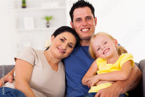 Photo: happy young family at home happy young family at home