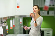 Young woman shopping for furniture in a furniture store