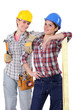 Two young women laborers in workwear