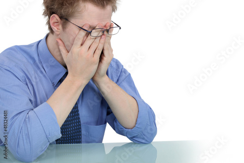Photo: young businessman looking tired young businessman looking tired