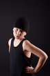 boy in a black T-shirt and a black hat