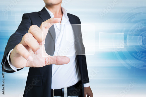 Photo: Businessman Holding Touchscreen In Hand Businessman Holding Touchscreen In Hand